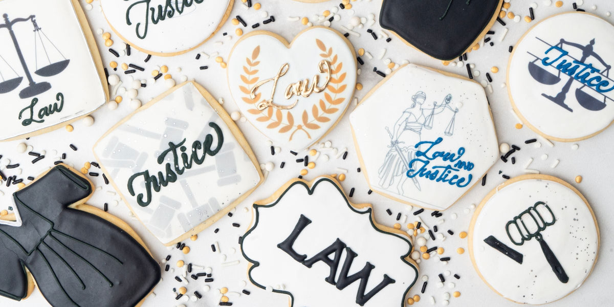 Law-themed sugar cookies with legal symbols and text.