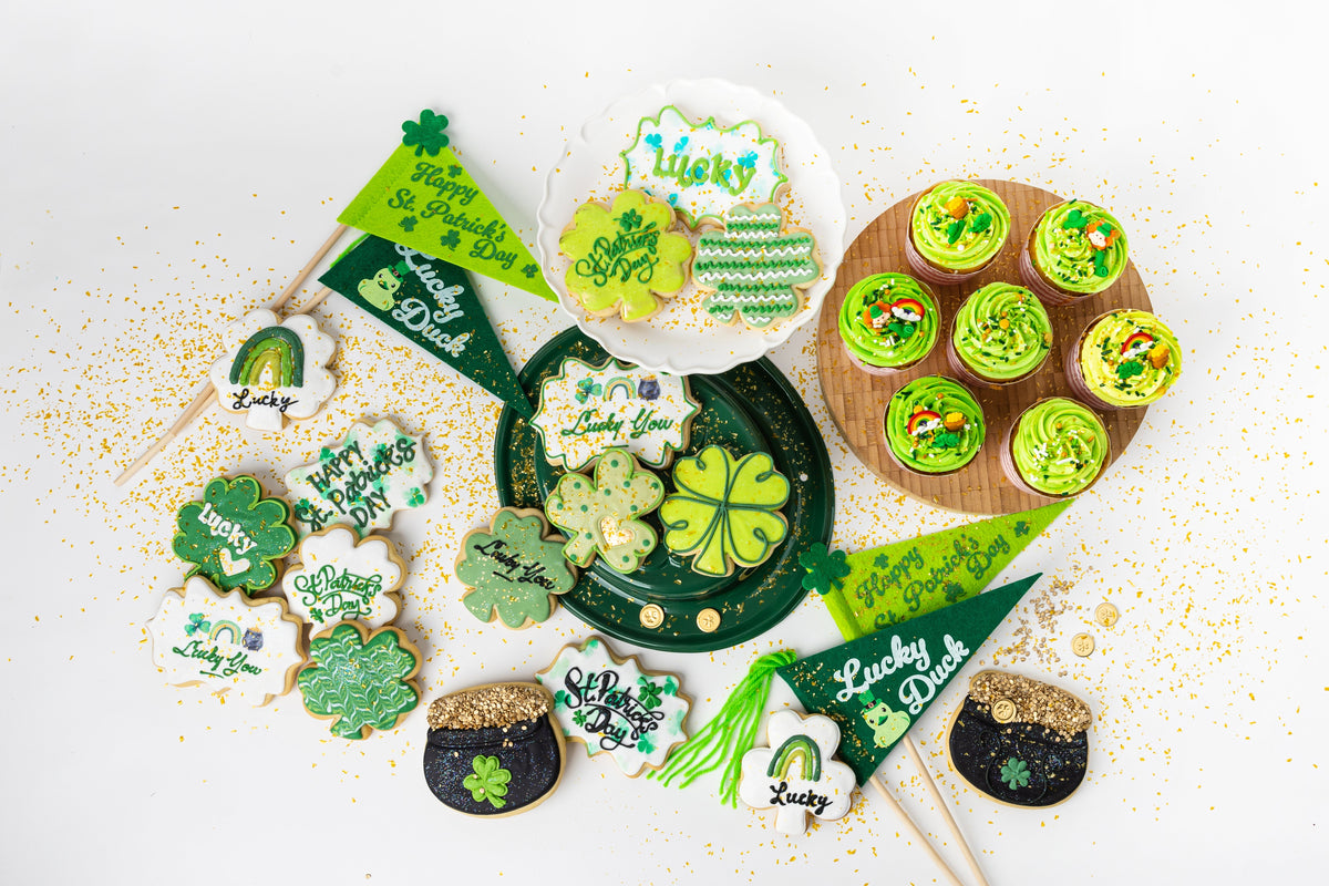 St. Patrick's Day themed cookies and cupcakes with green decor