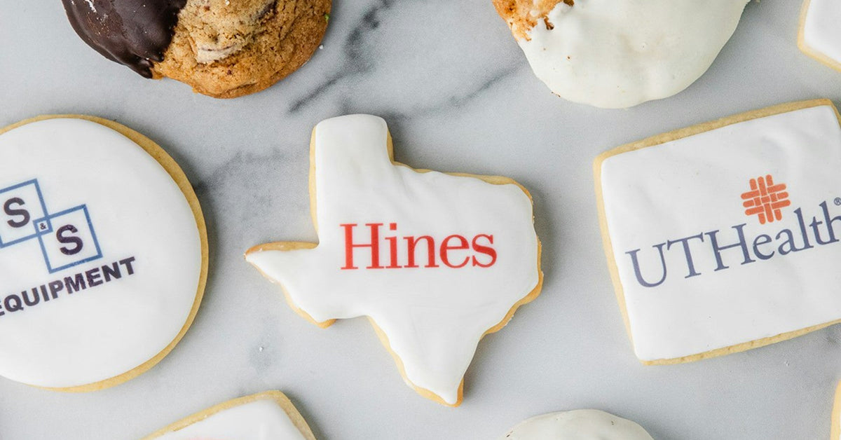 Custom logo sugar cookies on a marble surface