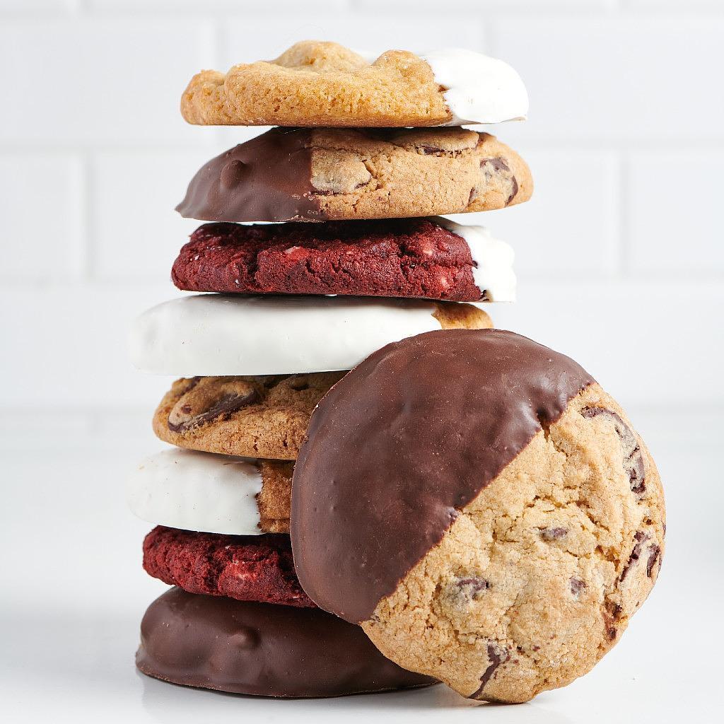 Stack of assorted chocolate-dipped cookies